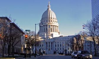 Wisconsin companies city of Madison join challenge to cut carbon emissions in half by 2030 | Wisconsin Public Radio